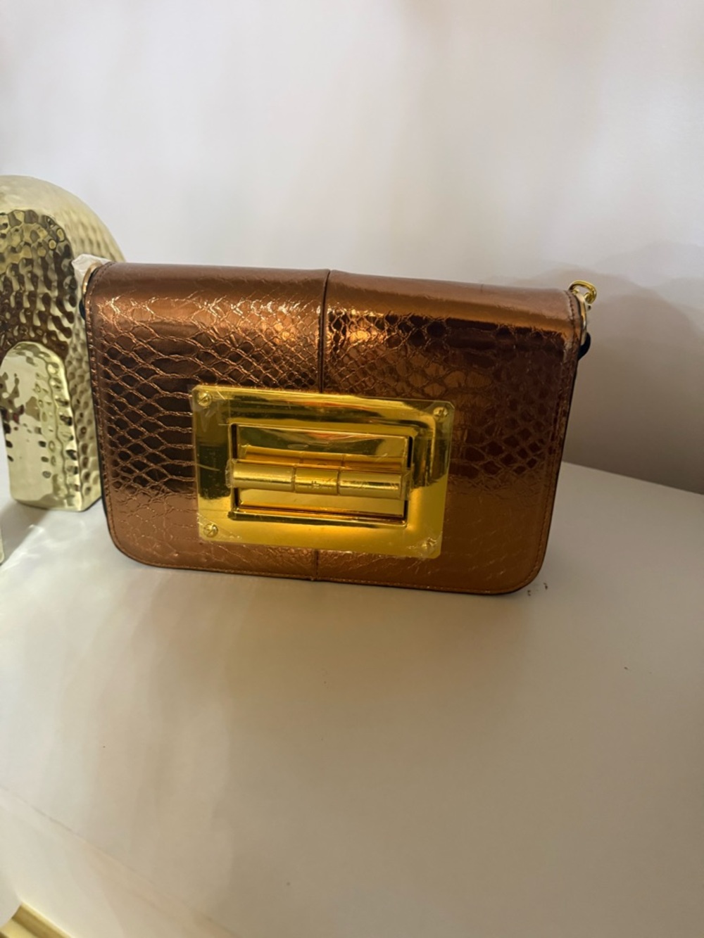 Metallic Copper Crossbody with Gold Plaque